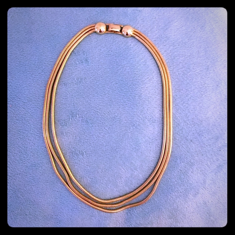 Costume three strand short gold color necklace